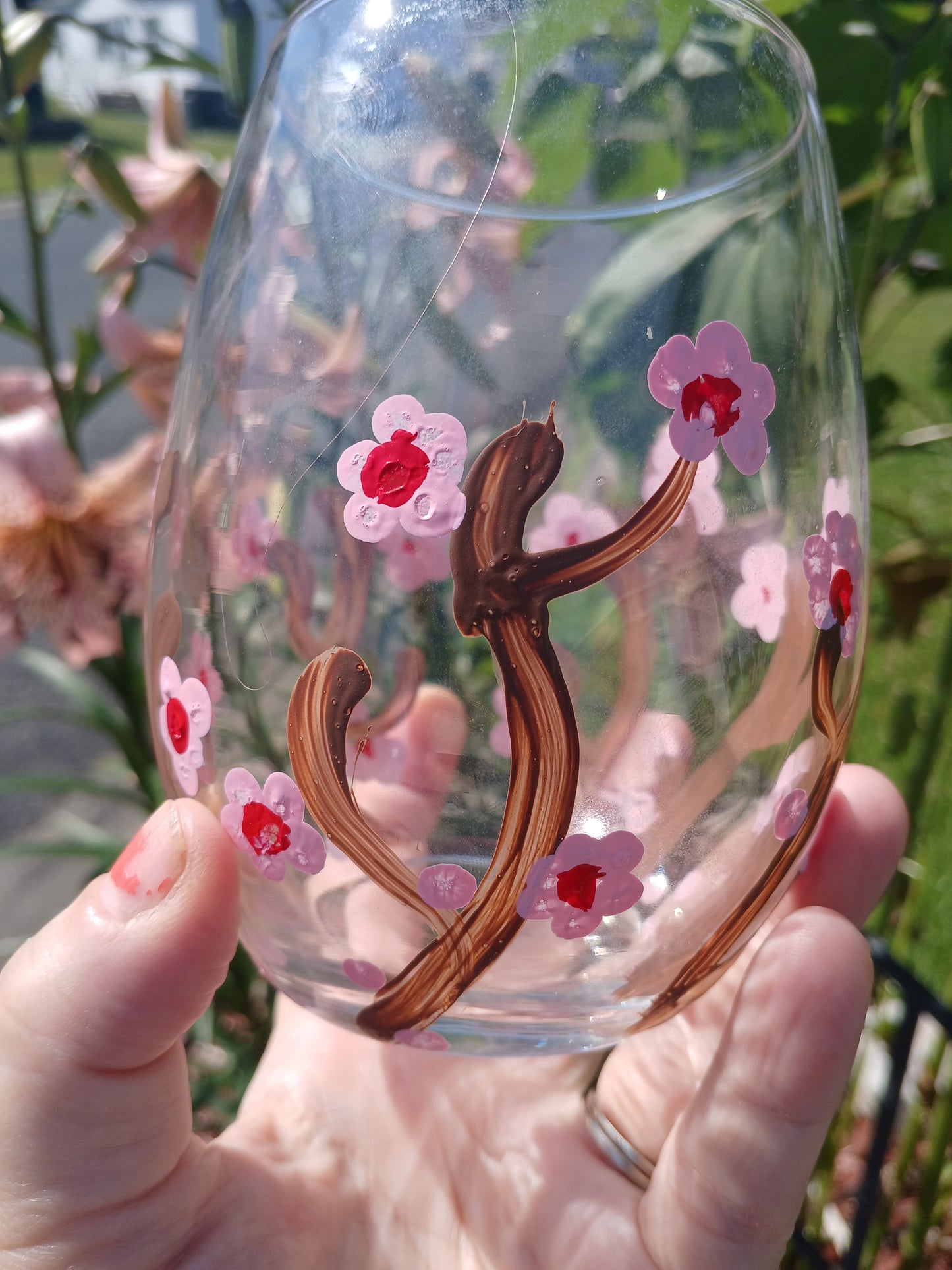 Hand painted cherry blossom stemless wine glass