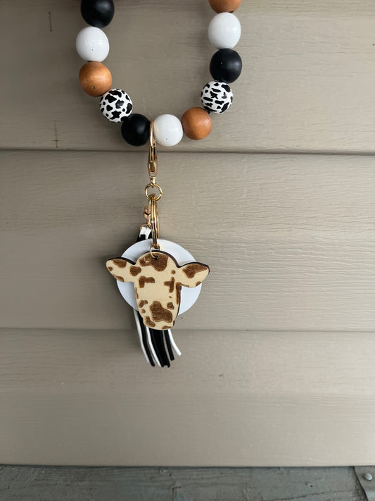 Cow inspired keychain wristlet