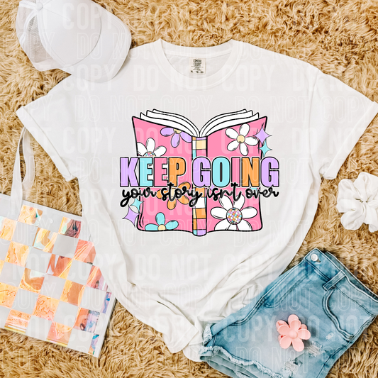 Keep going...your story isn't over white graphic tee