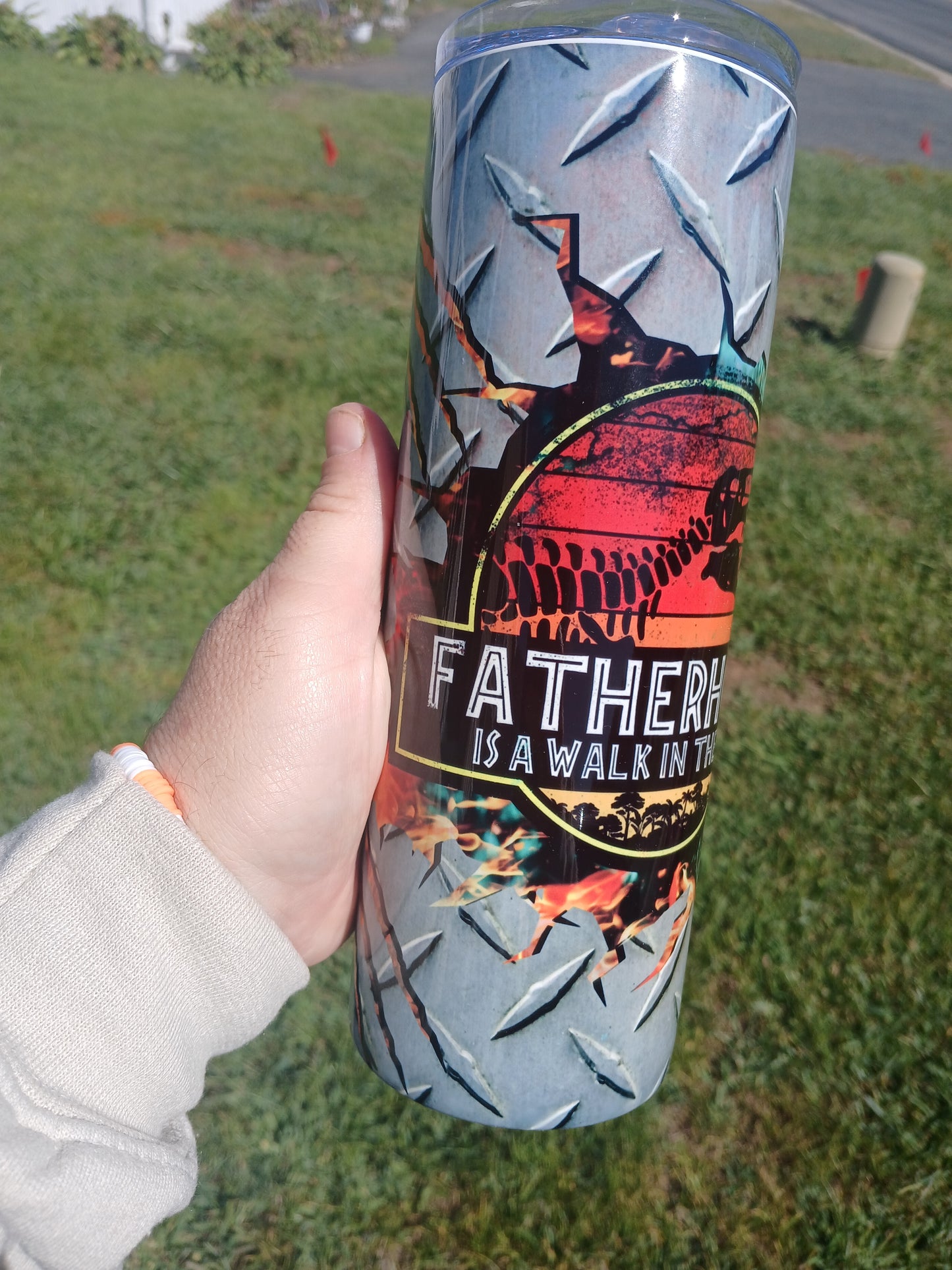 Fatherhood is a walk in the park 20 oz tumbler