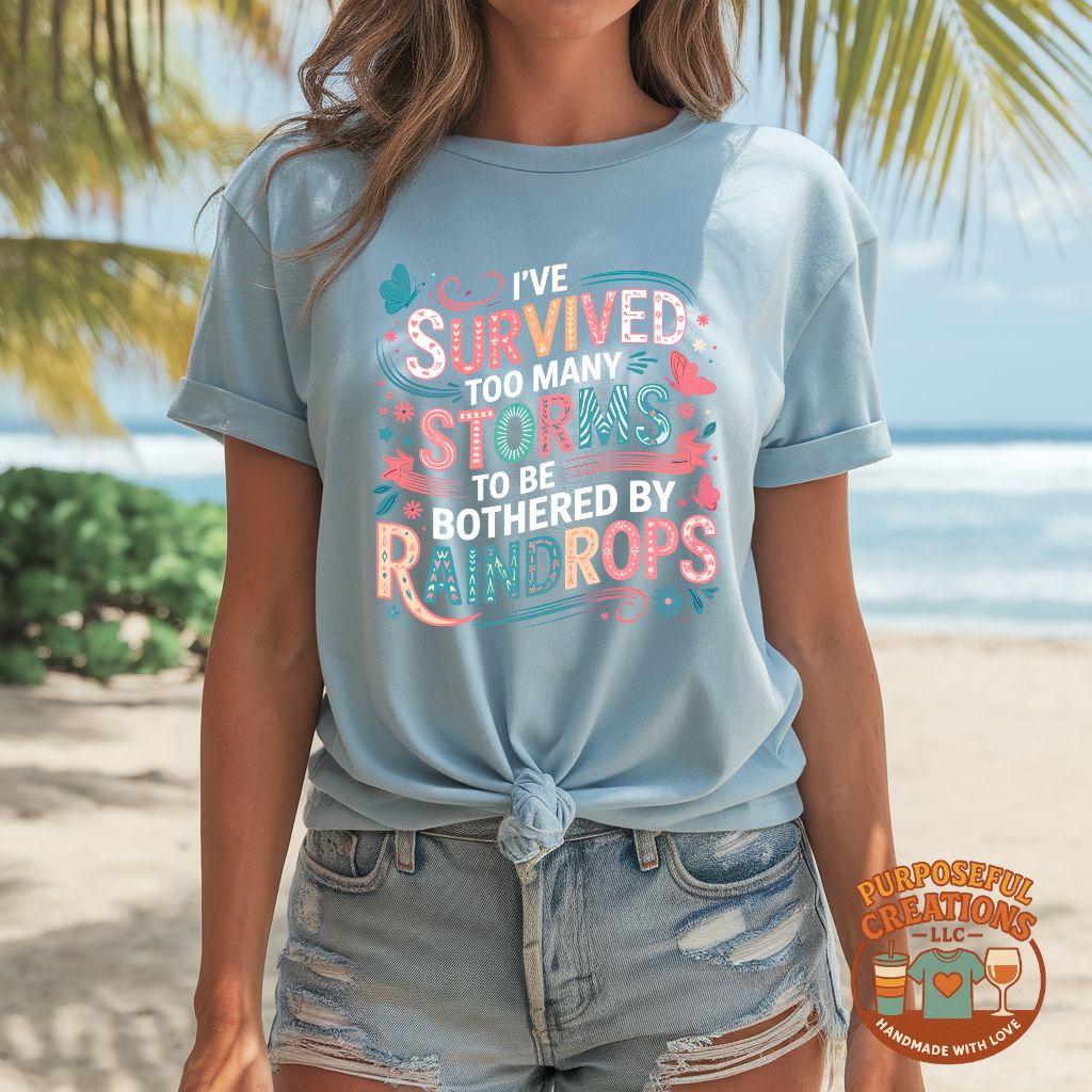 I've survived too many storms to be bothered by rain drops graphic tee